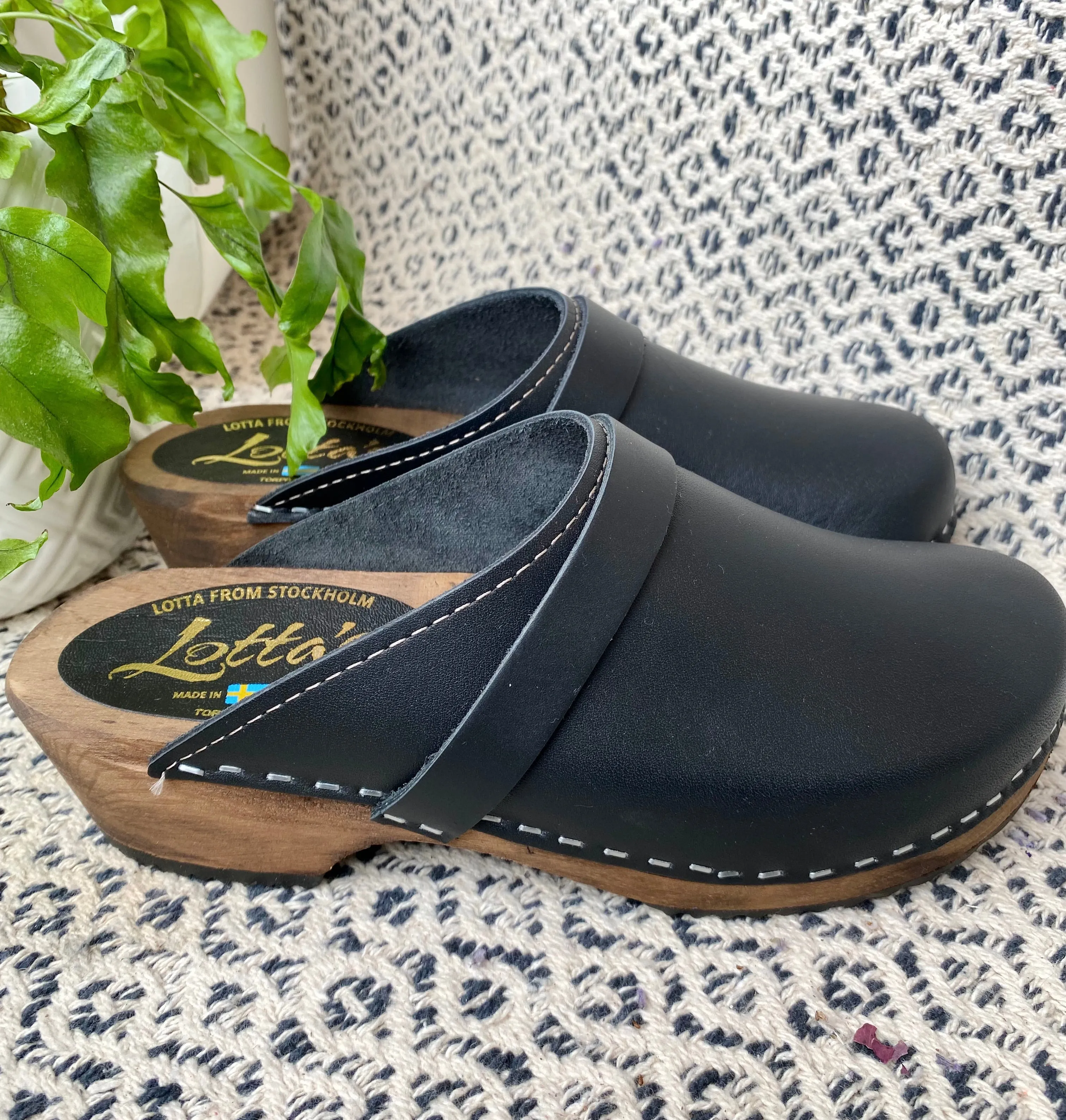 Classic Black Clogs on Brown Base