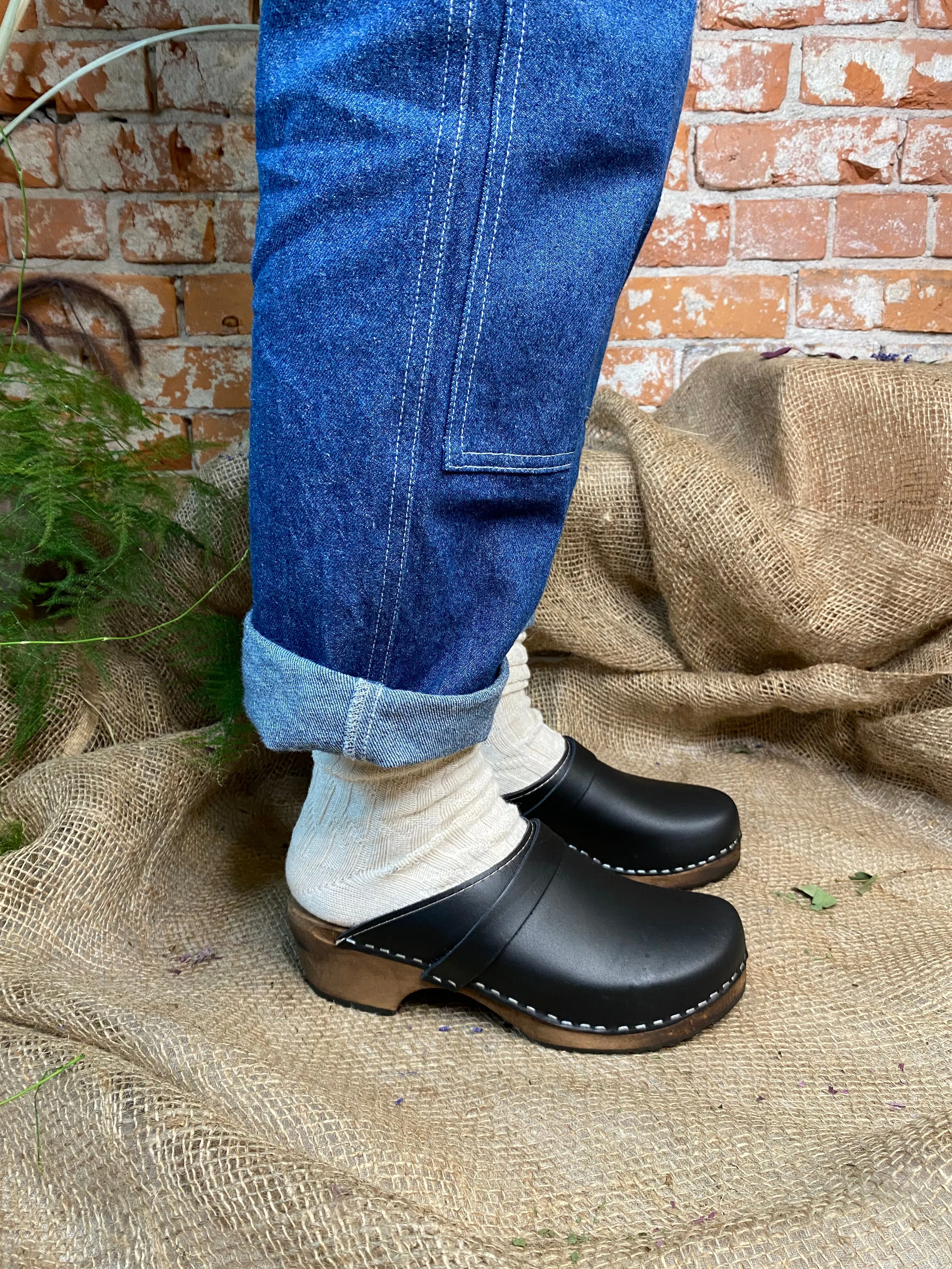 Classic Black Clogs on Brown Base