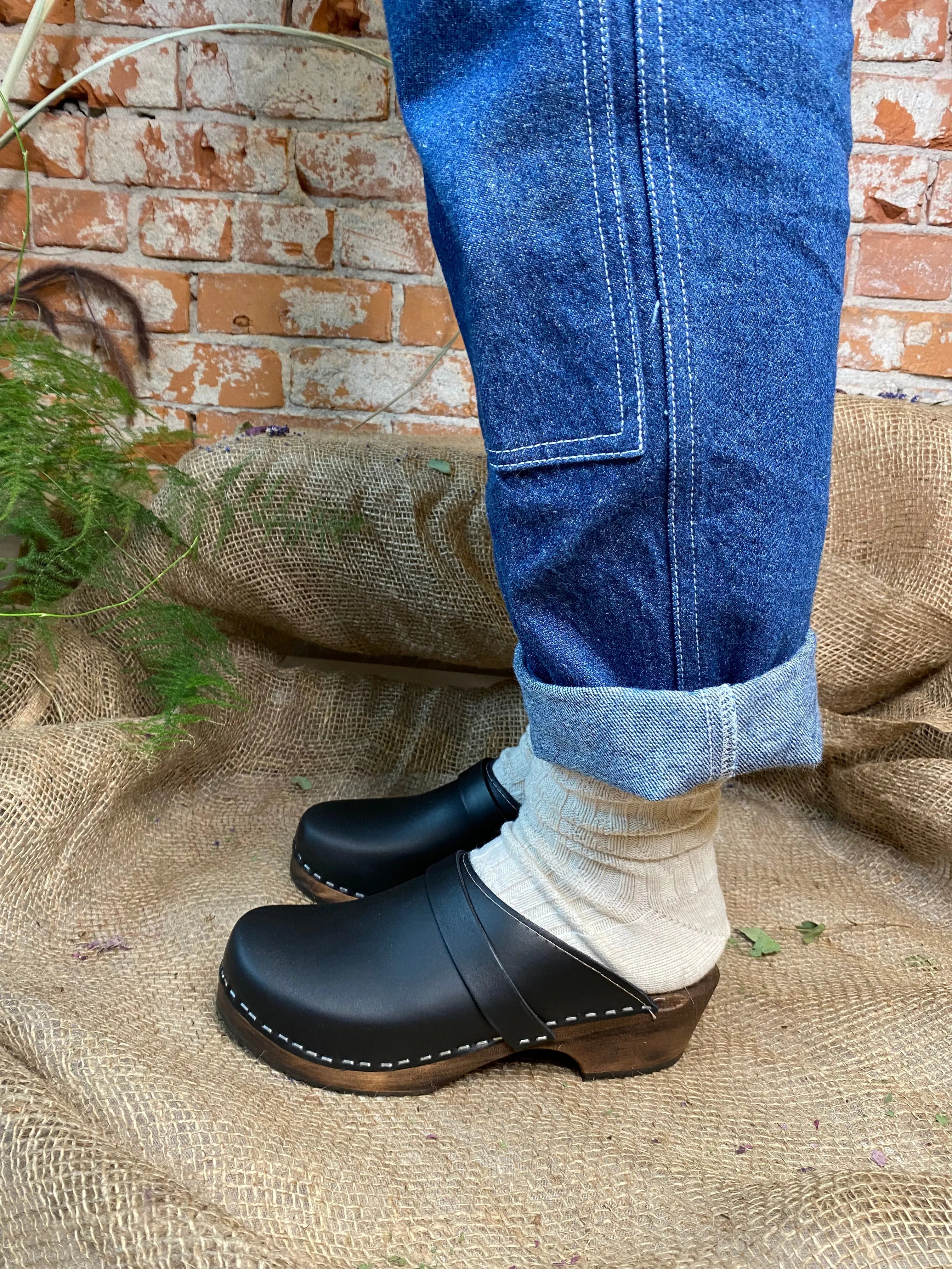 Classic Black Clogs on Brown Base